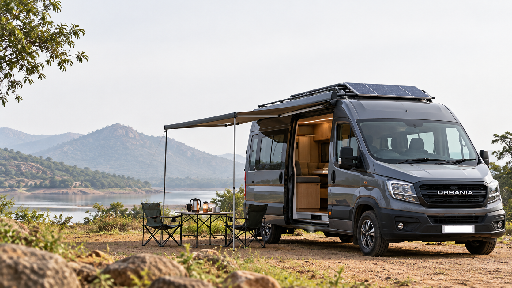 Urbania campervan with solar panels by a lake